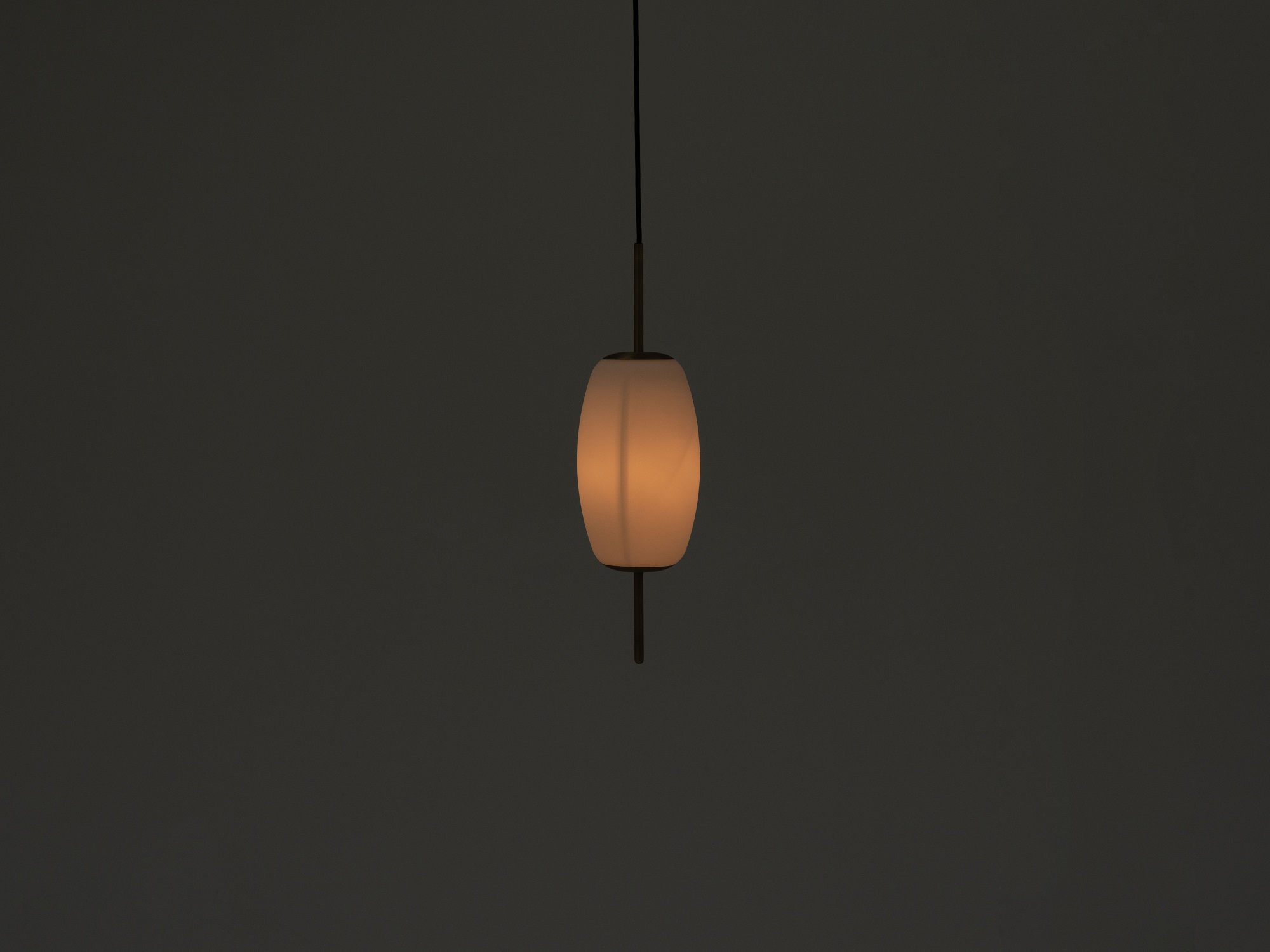 The small brass Silk kitchen pendant lamp with light on